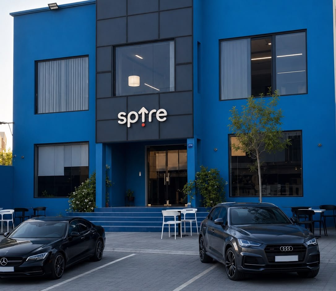 Spire Hub's blue office building exterior in Seef, Bahrain — coworking space and private offices for startups